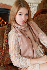 blonde stunner keeps herself warm in a crochet cardigan 00
