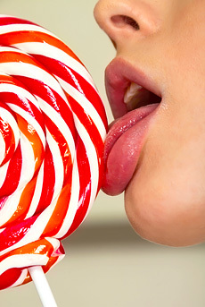 Hungry Teen Babe Winnie Licks A Lollipop